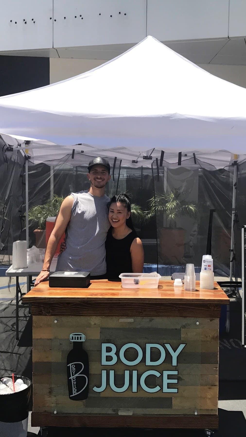 Ben and Jessica Wells at the Body Juice farmers' market stand