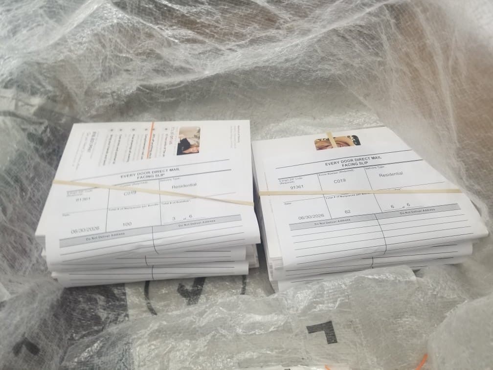 Postcards bagged for the post office