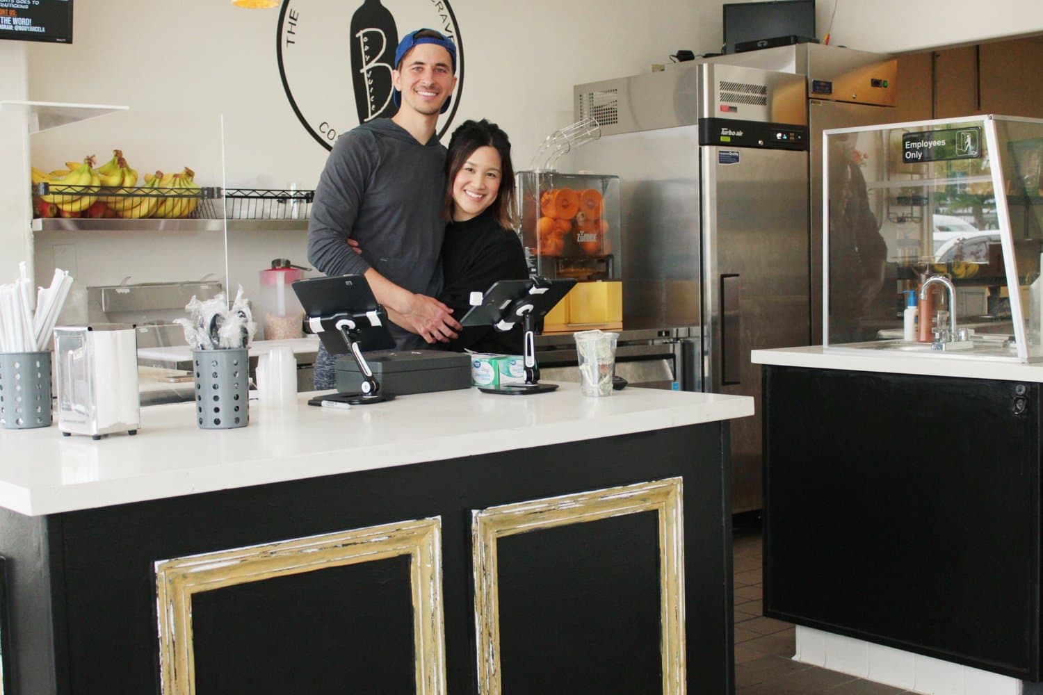 Ben and Jessica Wells behind the counter at Body Juice